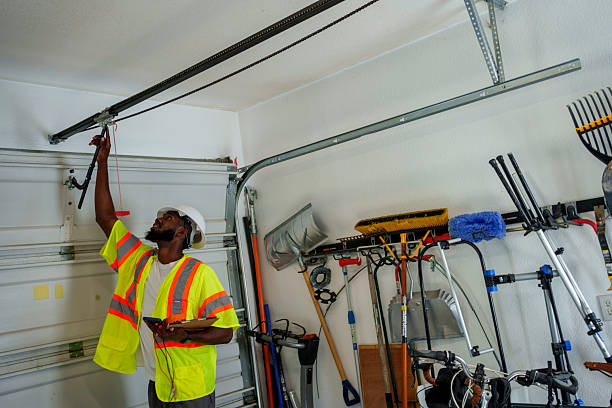 Professional Garage Door Installation technician working in Salisbury, MO
